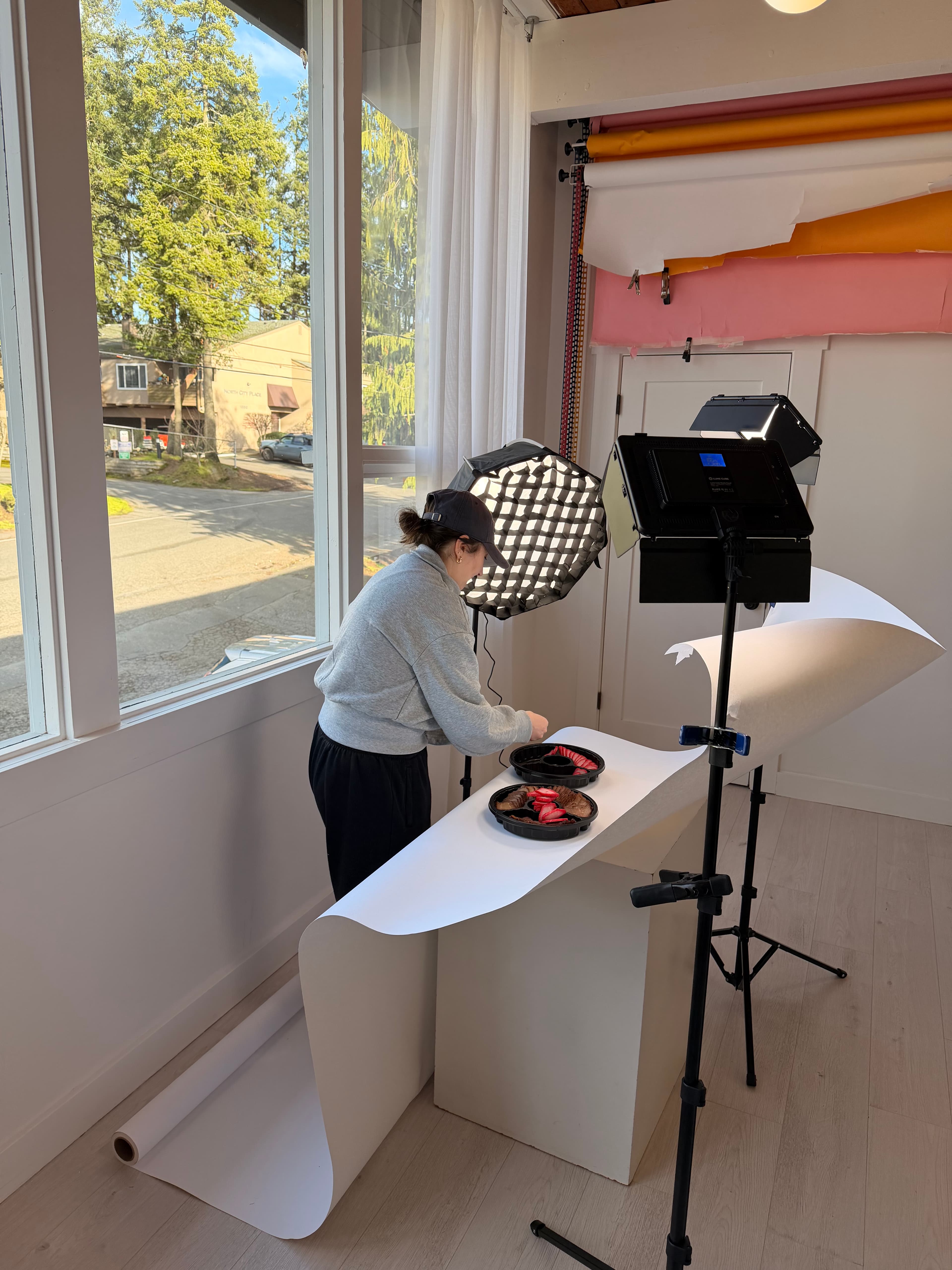 Behind the scenes: setting up lighting for a professional photo shoot